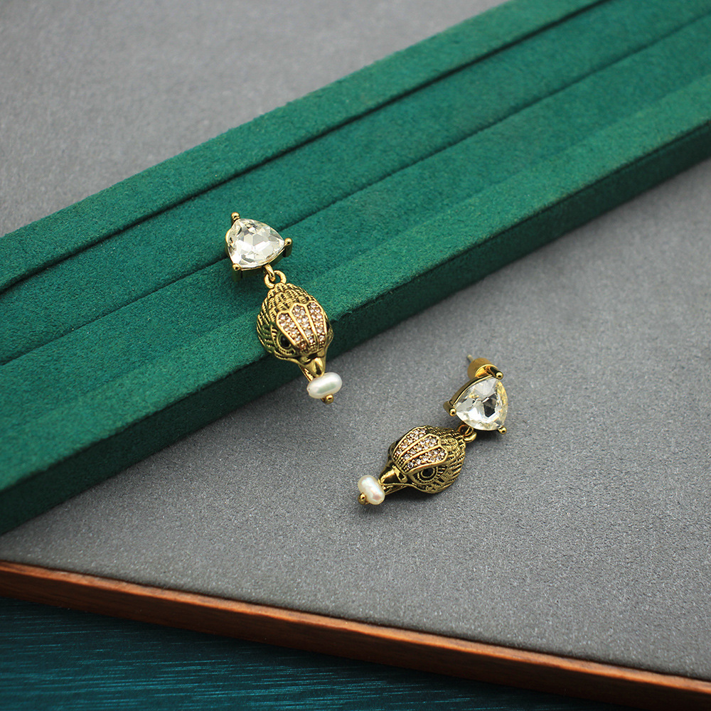 Vintage Eagle Head Stud Earrin - огляд і ціна Women'S Eagles Accessories